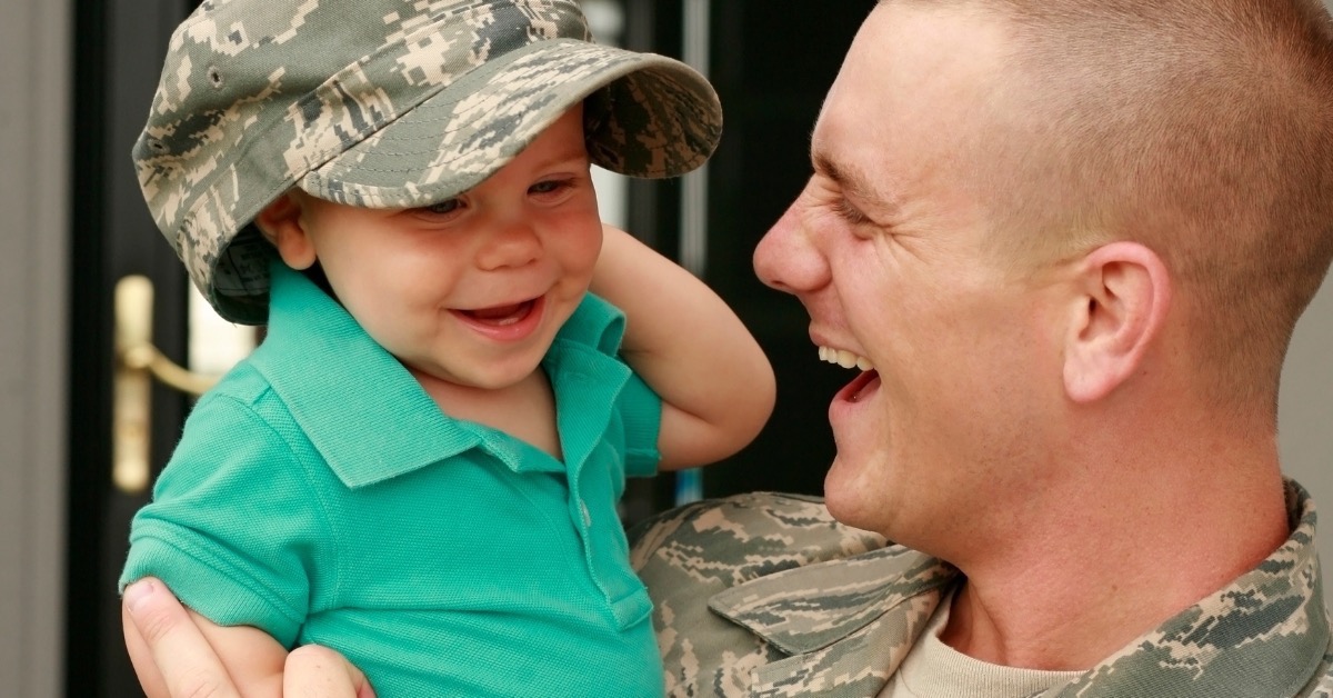 Military Official Playing With His Child