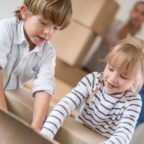 Children Packing Boxes